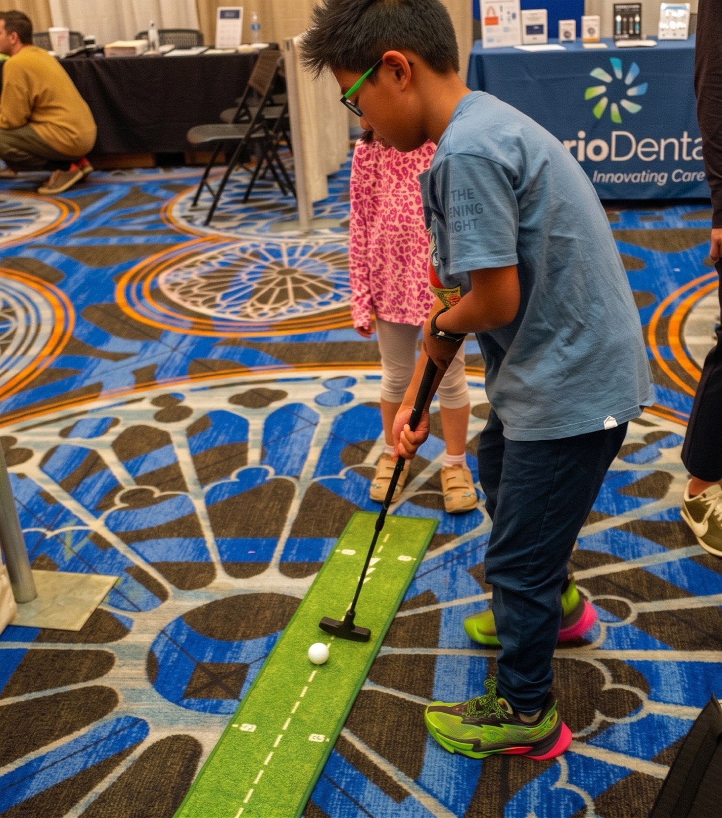 The putting green at the Echo booth at AGD 2026