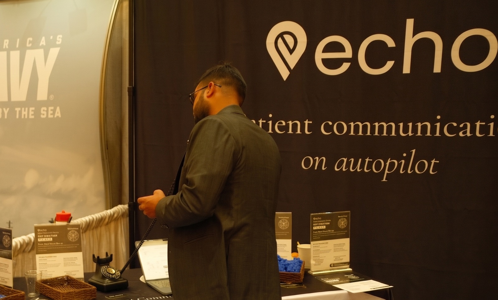 A visitor speaking to Echo in their own language at the booth